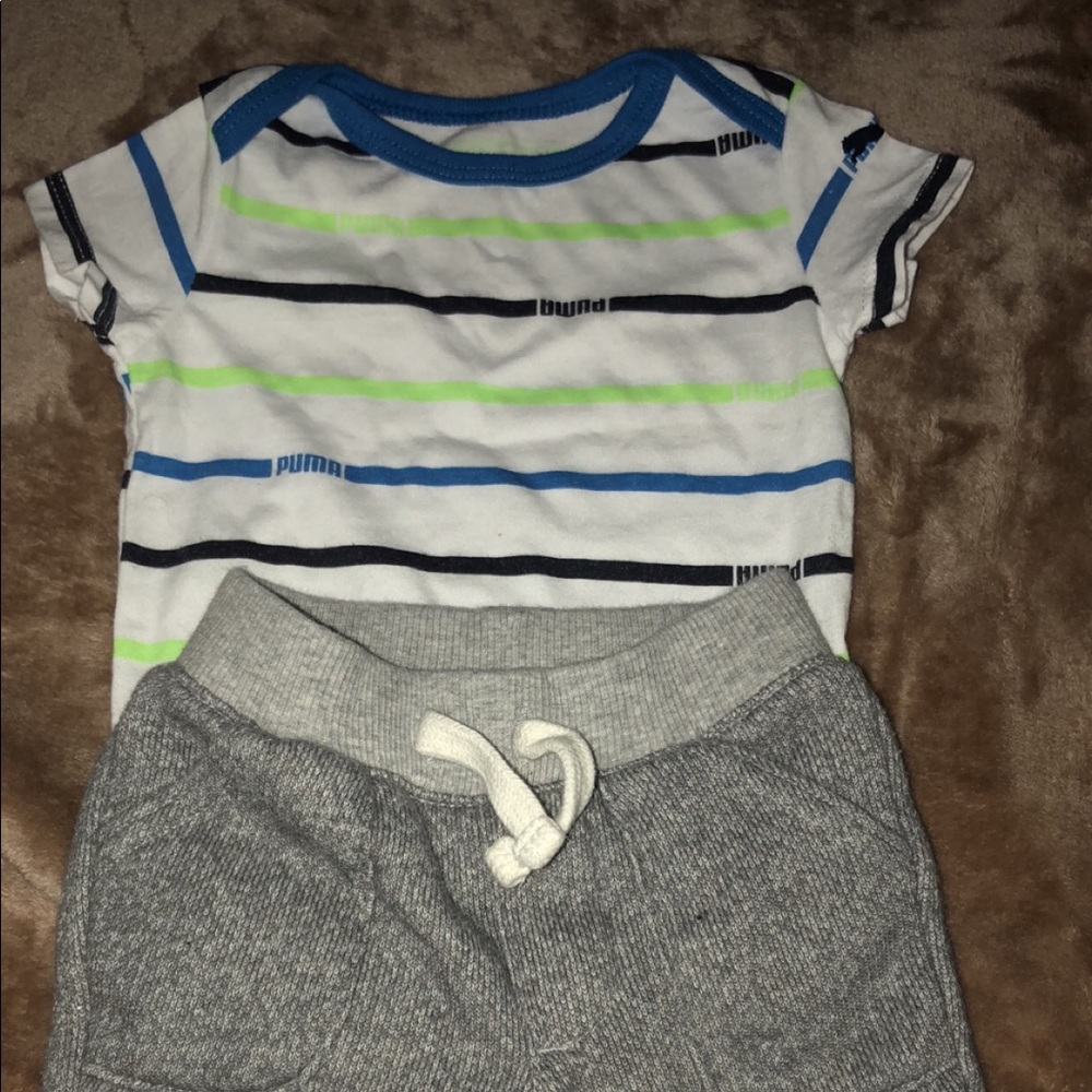 Puma bodysuit and baby sweatpants.